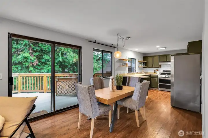 Large windows bring the outdoors in and fill the space with natural light.