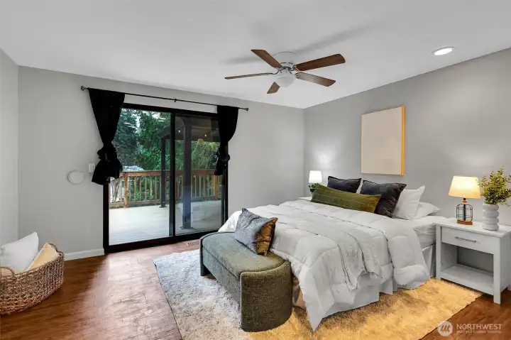 A spacious bedroom with room to unwind and recharge.