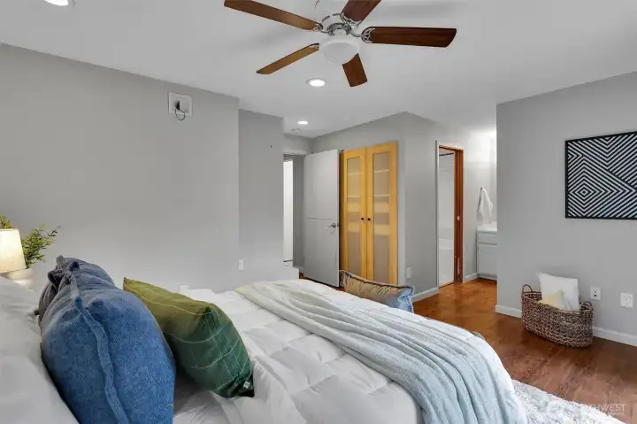 A bright bedroom with natural light and plenty of space.