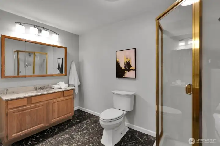 A spacious bathroom with plenty of room for daily routines.