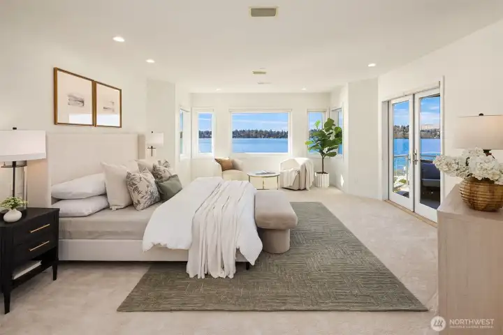 The primary suite: a spacious lakeside sanctuary featuring a private balcony for quiet morning coffee and starlit evenings.