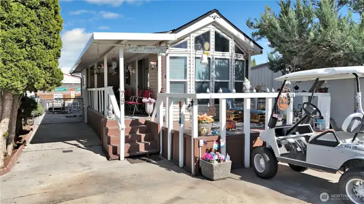 Small front patio ideal for outdoor seating and relaxation