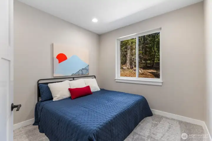 Main level bedroom for added flexibility and convenience.