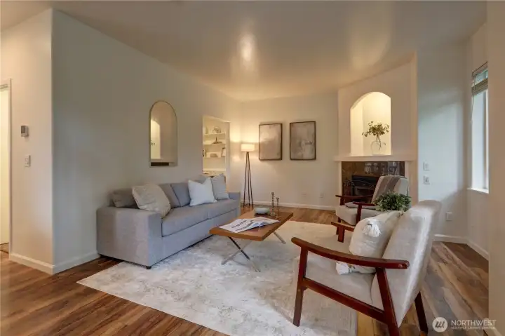 Corner gas fireplace creates a cozy focal point.