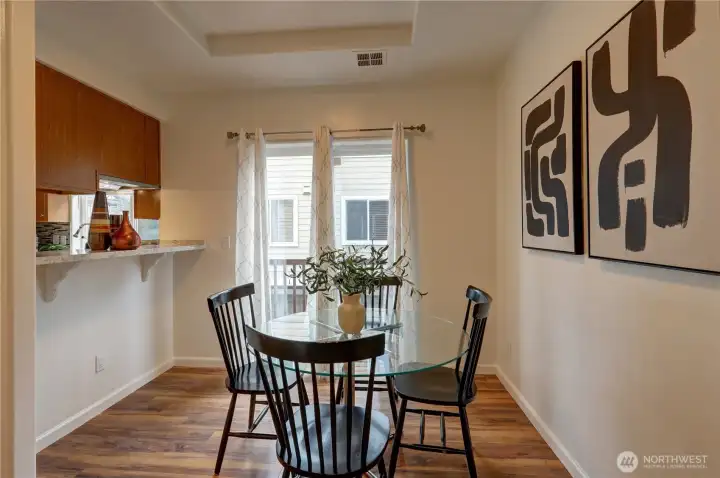 Dining area seamlessly connected to the balcony.