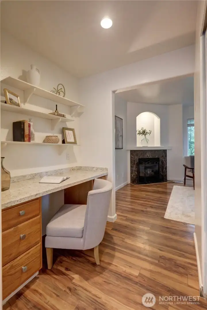 Off the dining area is a convenient planning desk and workspace.
