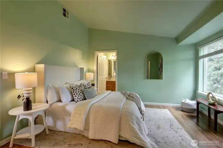 Spacious primary suite offers a private retreat.