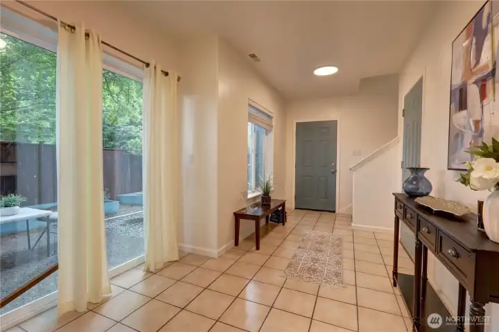 Direct access to the patio and yard from the lower level.