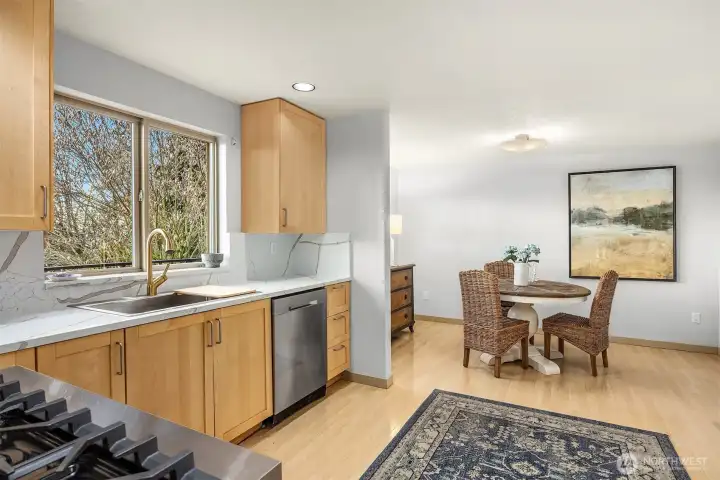 The oversized sink and brushed gold faucet overlook the deck and views. The oversized sink and brushed gold faucet overlook the deck and views.