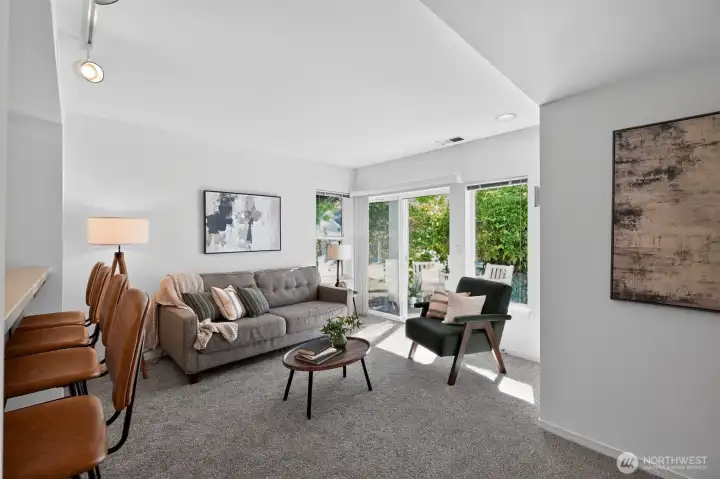 Multiple living spaces provide flexibility for entertaining