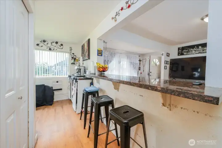 Unit A Entry and Eating Bar adjacent to kitchen. Unit A Entry and Eating Bar adjacent to kitchen.