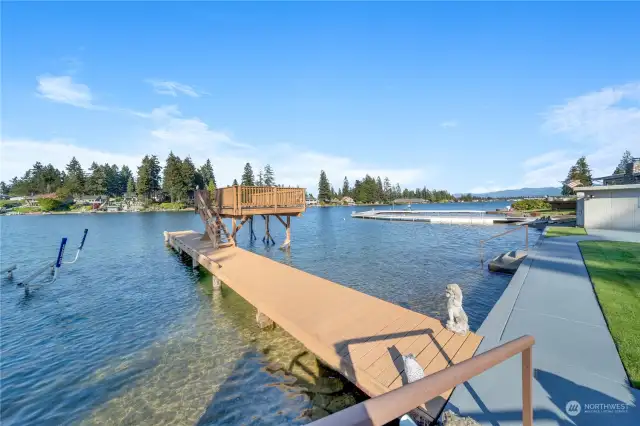 Incredible dock with a raised deck for entertaining and sunbathing.