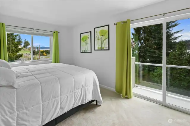 Top floor bedroom with water views and full bath just outside the door.