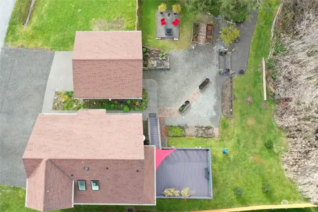 Drone view of the home, garage.