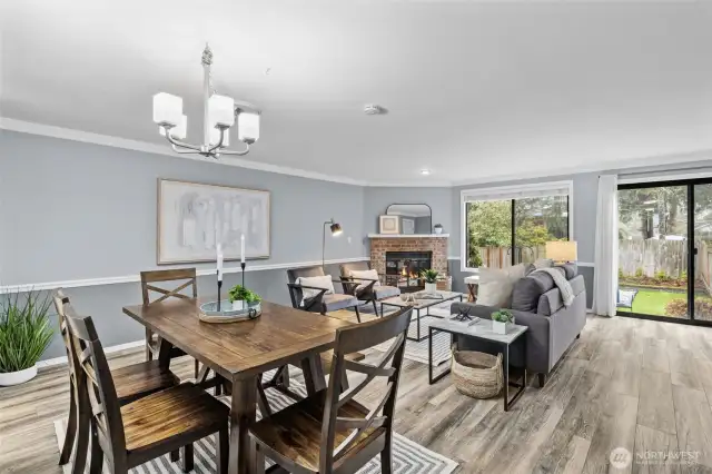 Dining room opens to spacious living room.