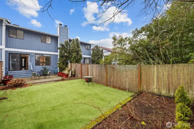 Backyard is private and has plenty of room for gardening and entertaining.