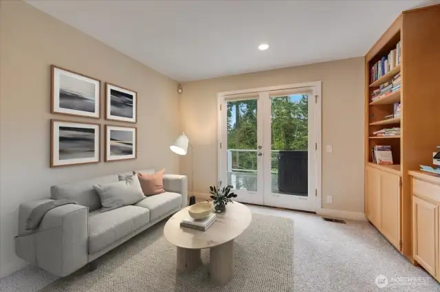 Main floor home office/den with built ins