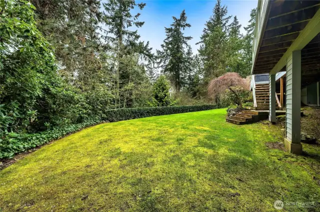Private back yard overlooking a green belt