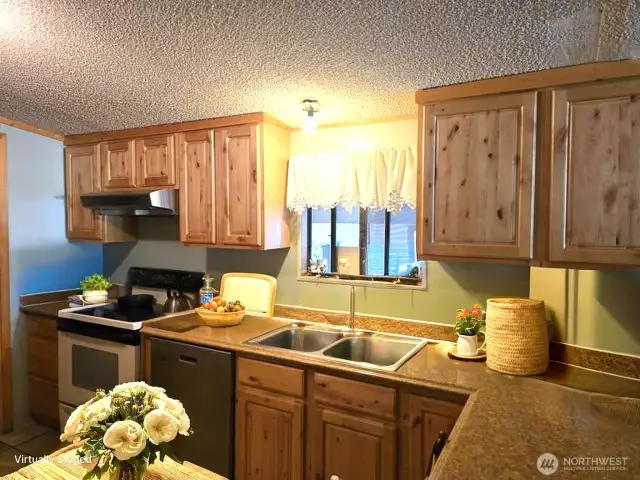 This photo is virtually staged to give you ideas of how you may like to decorate your kitchen.