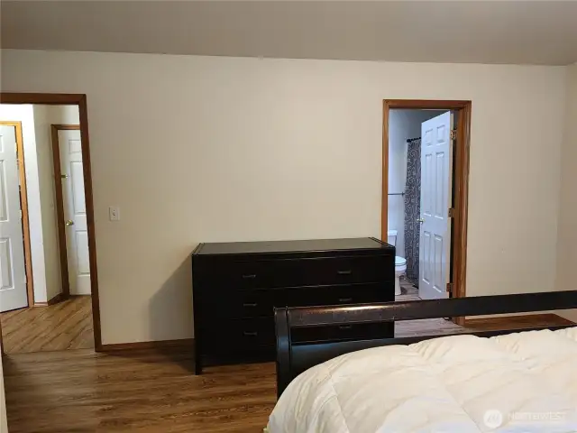Primary bedroom with en-suite on the right.