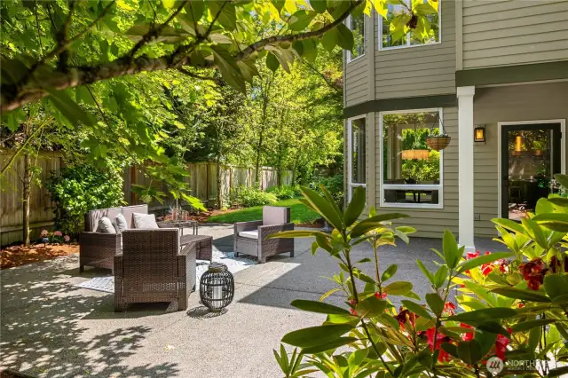 Relax in your private patio setting while listening to sounds of the outdoor water feature.