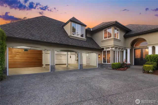 Expansive 3 Car Garage with extra storage.