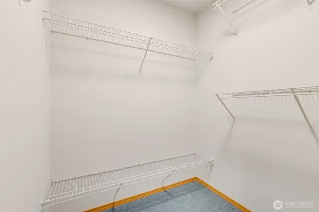Great storage space in the primary bedroom closet.