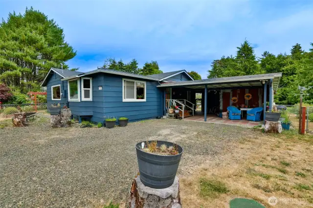 Driveway & carport leading to entry