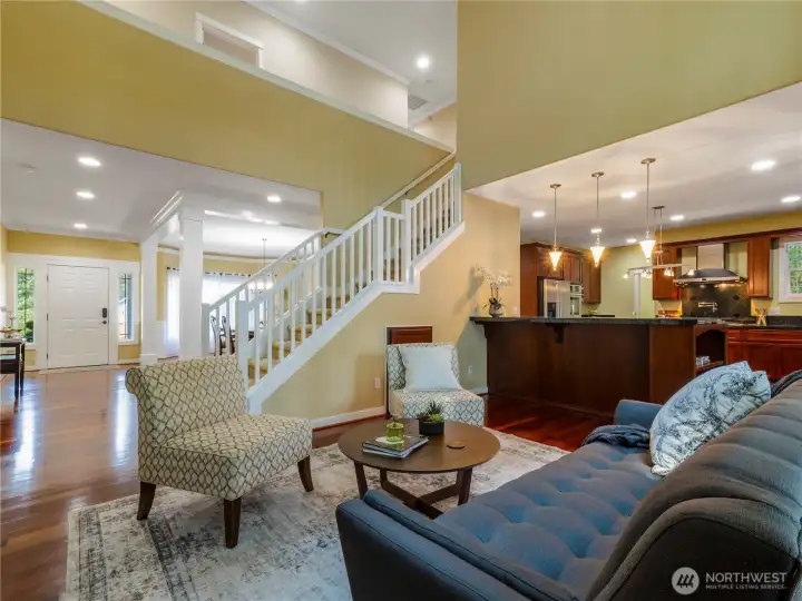This stunning home offers the perfect blend of modern design and timeless elegance...vaulted ceilings, extensive hardwood flooring, white doors & millwork throughout.
