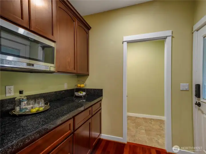 Generous counter space, cabinets for all of your kitchen ware and small appliances, plus an amazing walk-in pantry ready for your customization!
