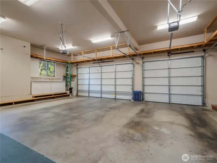 3 Car Garage with lots of space; room for cars, storage, workout/weight room, etc.
