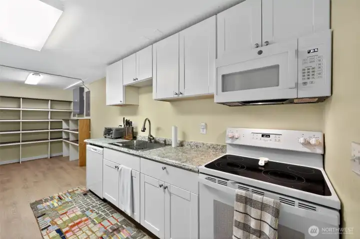 Lower area features additional kitchen