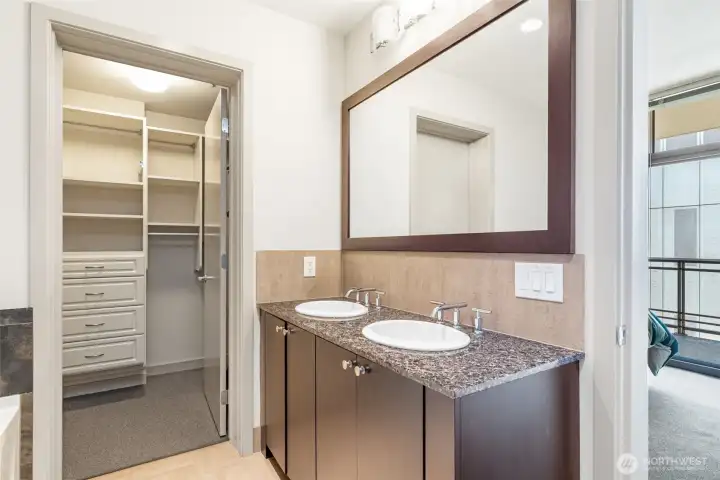 Dual vanity and easy closet access.