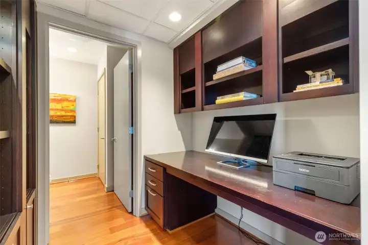 Built in desk and storage in the den.