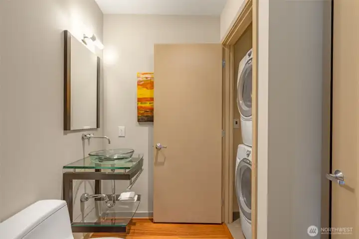 Tidy fully size washer and dryer discreetly housed.