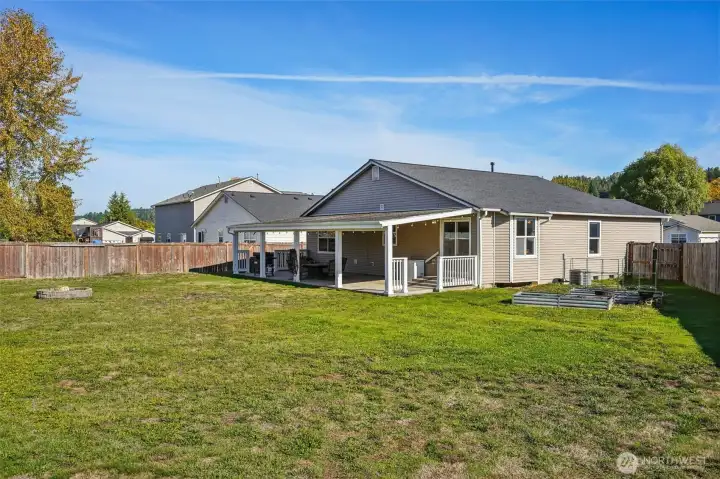 Terrific backyard offers room for all your backyard fun and game, plus room for pets to run and play too!