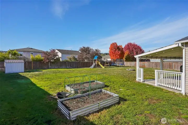 There are raised garden beds ready for your green thumb.