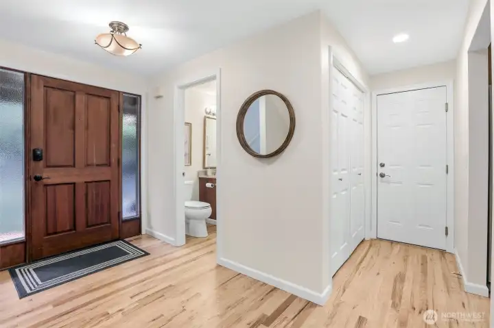 Main floor entry shows the beautiful, recently refinished hardwoods.