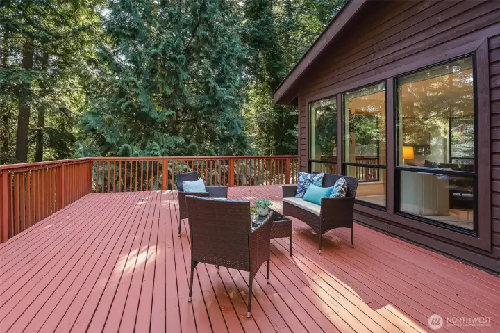 Massive deck with multiple entertaining spaces.