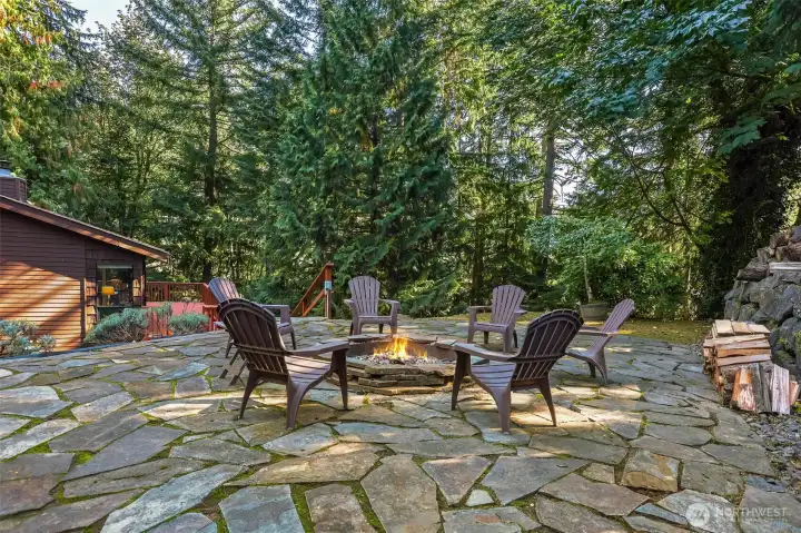 The fire pit are is a place of constant summer gatherings.
