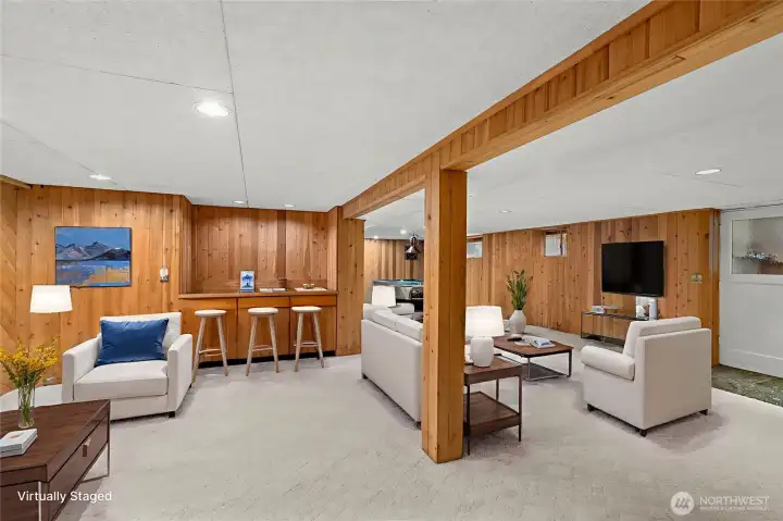 Family room with access to outside.  (Virtually staged to show the many uses.)