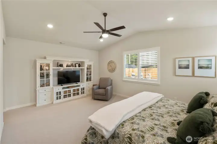 Luxurious primary suite with walk-in closet