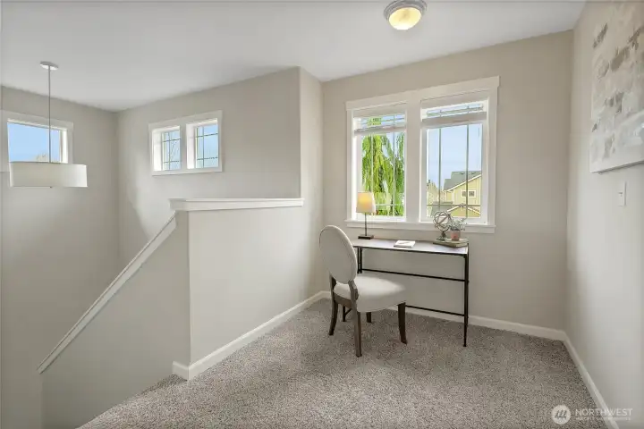 Upstairs is additional landing space for studying or play area.