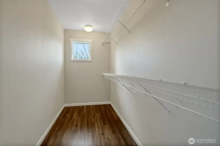 Huge walk in closet in primary bedroom