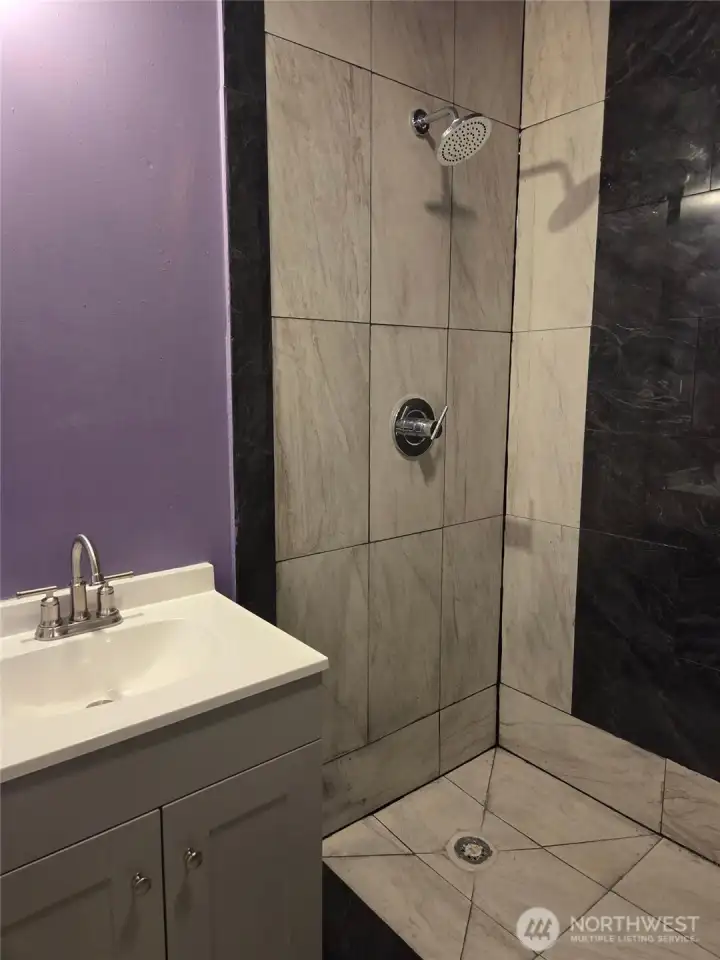 Newly tiled bathroom with fresh updates