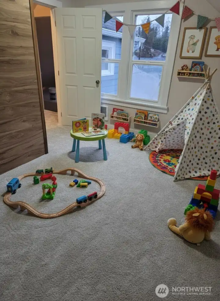 Upstairs bedroom #3 is virtually staged