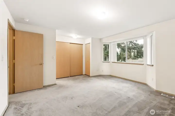 Closets in primary bedroom & full bath