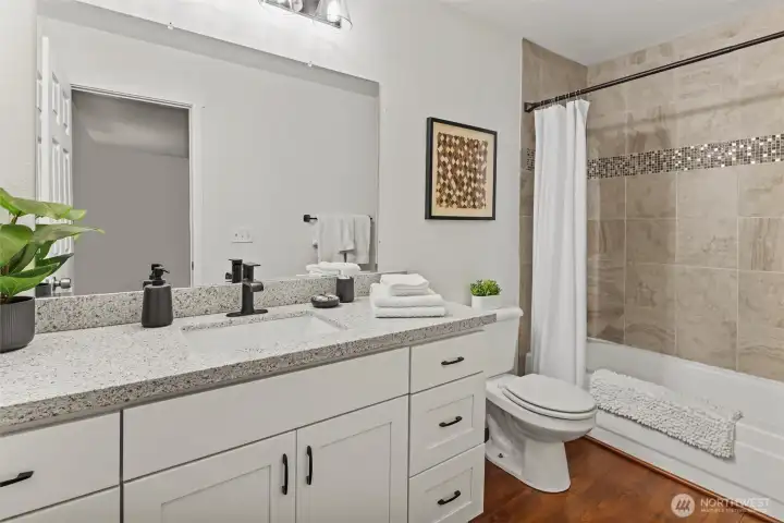 Large primary en-suite with full tub.