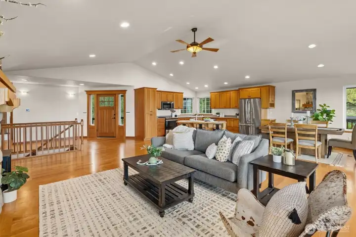 Entry into the open living, dining and kitchen area.