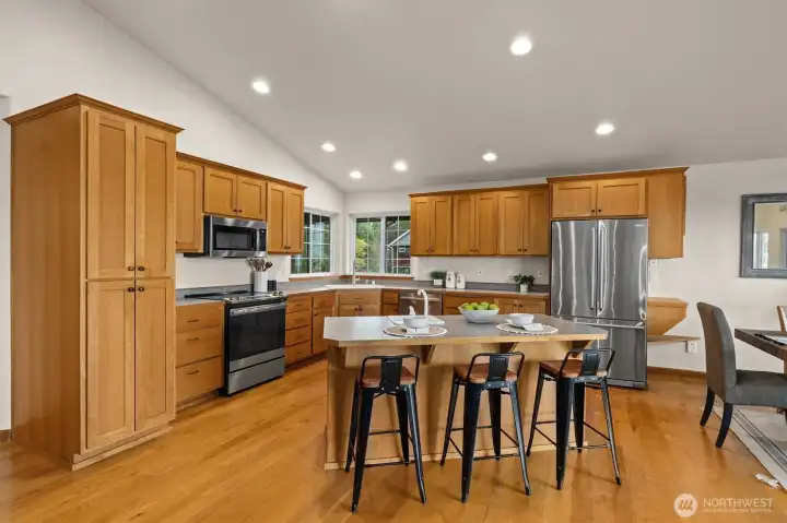 Guests can sit at the kitchen island and get a front row seat for mealtime.